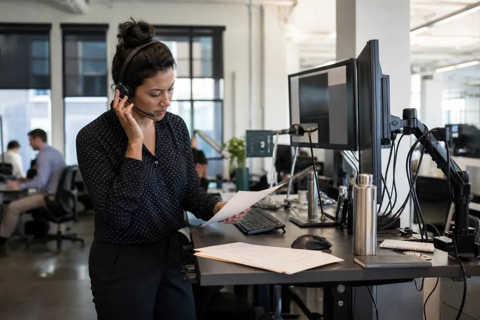 Sales operations manager reviewing a monthly bill of outreach software add-ons